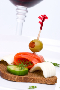 Finger food fiasco - the kind of creation that ends with an olive in the cleavage (& a toothpick in the chef's eye).